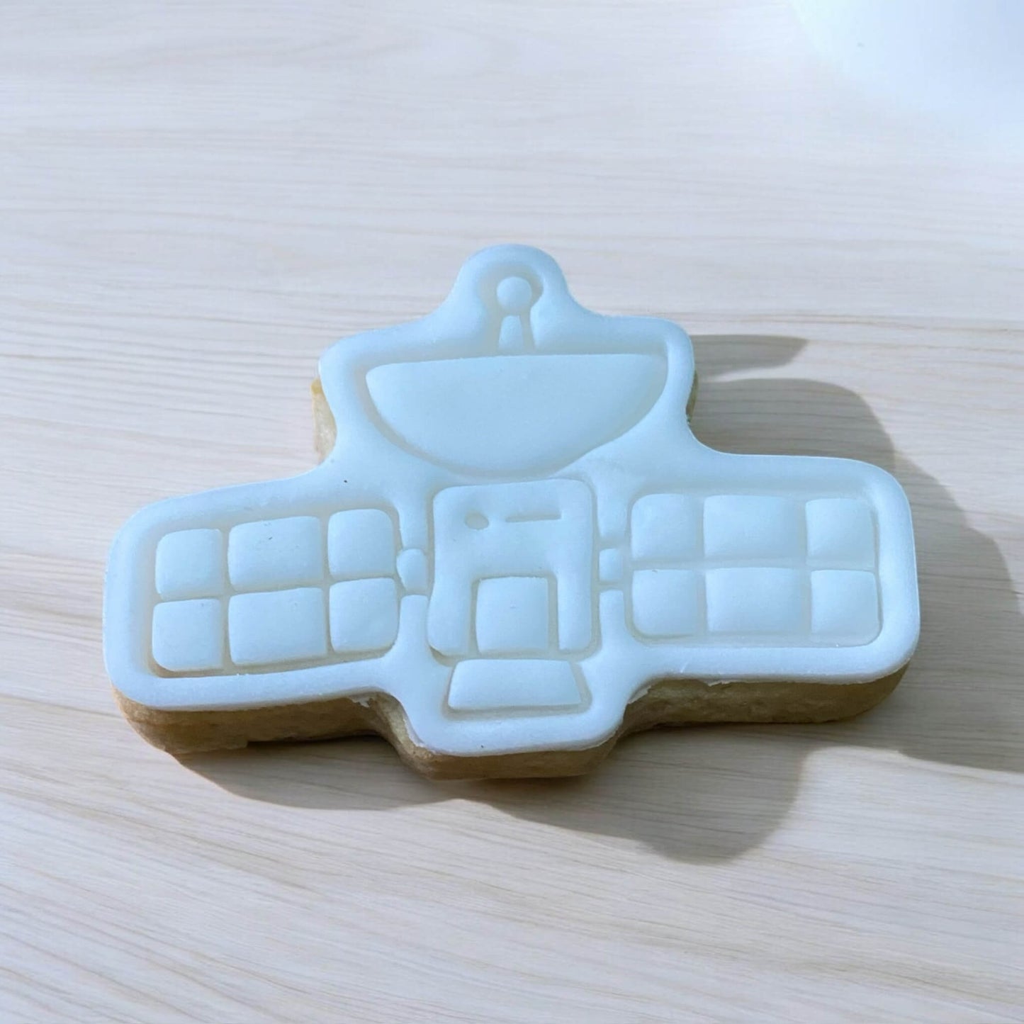 Spaceship Paint Your Own Cookie – rocket ship-shaped iced biscuit with edible paint palette and brush, fun and creative kids’ baking activity or space party treat.