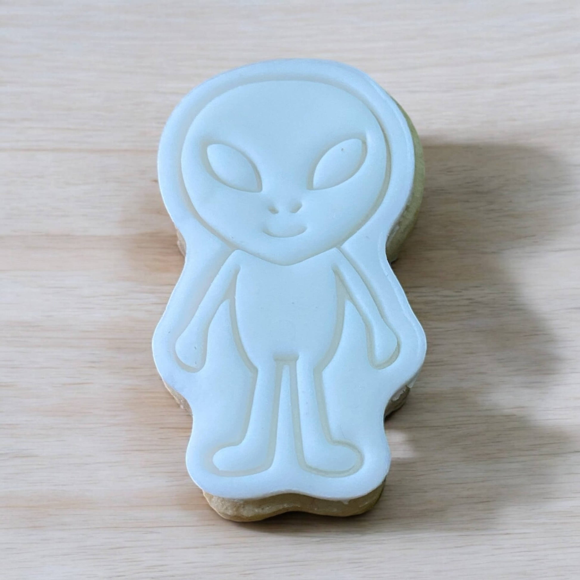 Alien Paint Your Own Cookie – fun alien-shaped iced biscuit with edible paint palette and brush, creative kids’ baking activity or space-themed party treat.