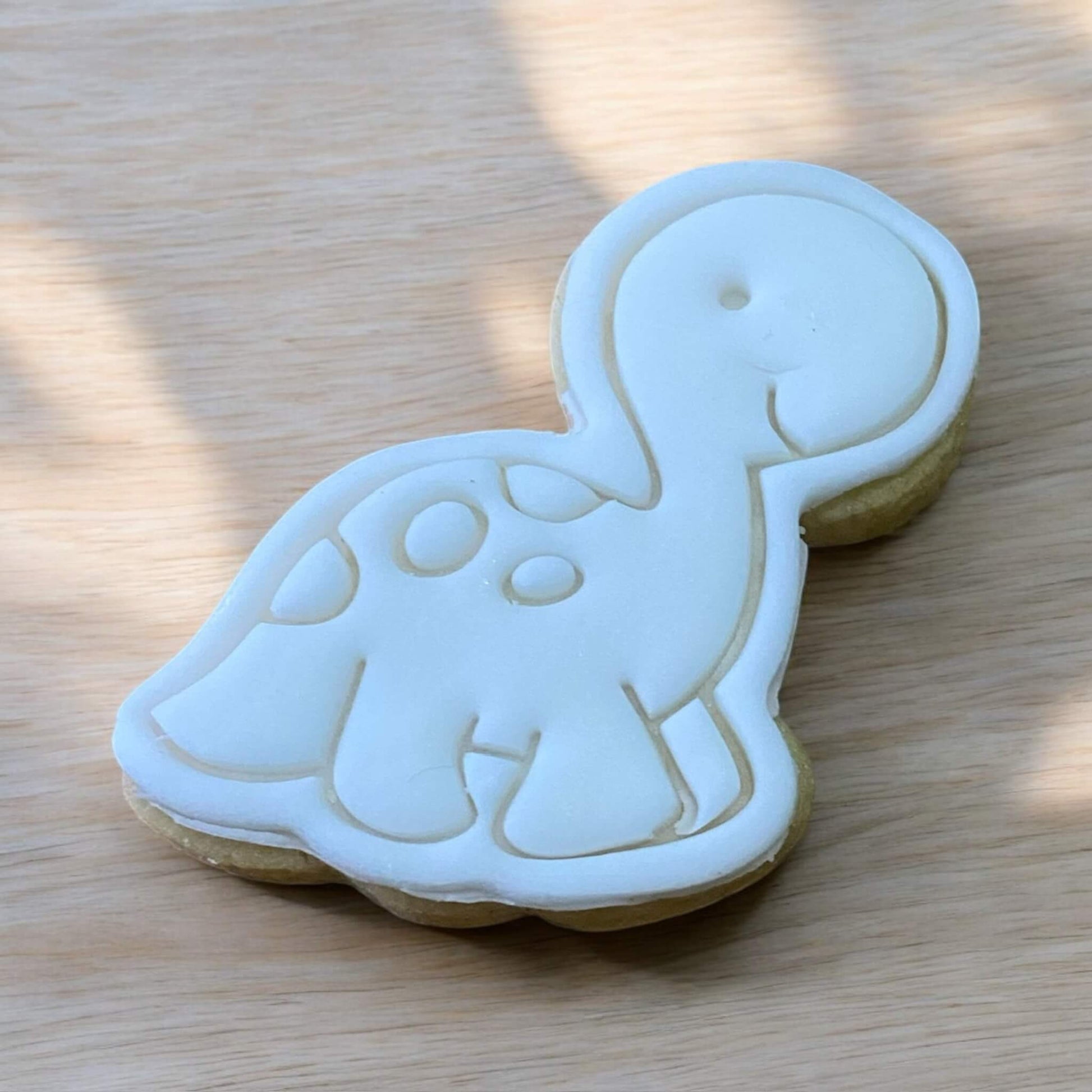 Brachiosaurus Paint Your Own Cookie – long-neck dinosaur shaped iced biscuit with edible paint palette and brush, creative kids’ activity and fun party treat.