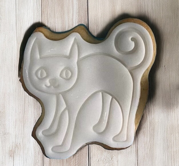 Black Cat Paint Your Own Cookie – black cat-shaped iced biscuit with edible paint palette and brush, spooky and fun kids’ Halloween baking activity or party treat.