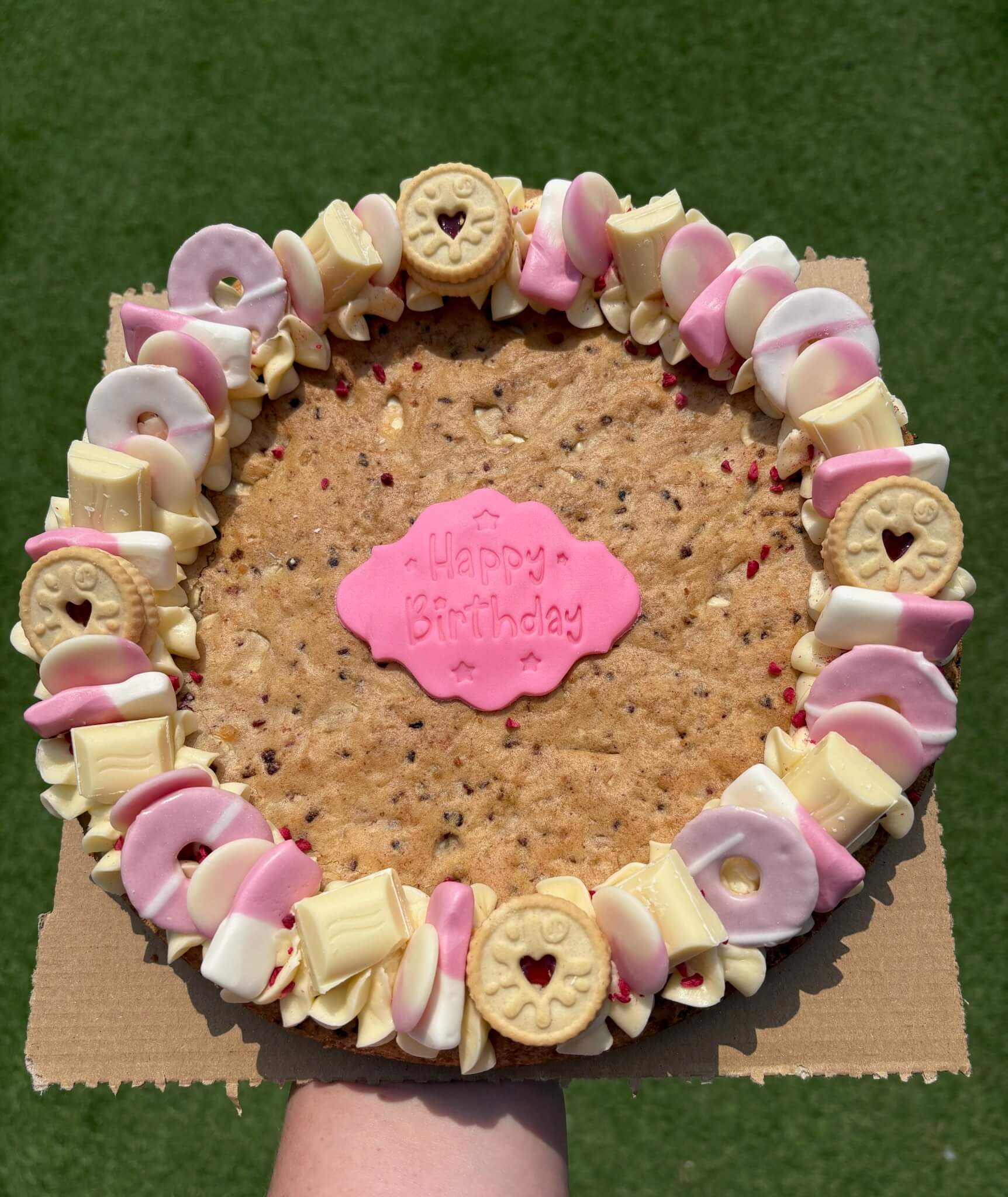 Bake My Day Celebration Cookie – personalised birthday cookie with coloured fondant centre saying ‘Happy Birthday’, decorated with customers’ choice of sweets and chocolates, perfect for children’s parties, special occasions, and giftable custom cookies.