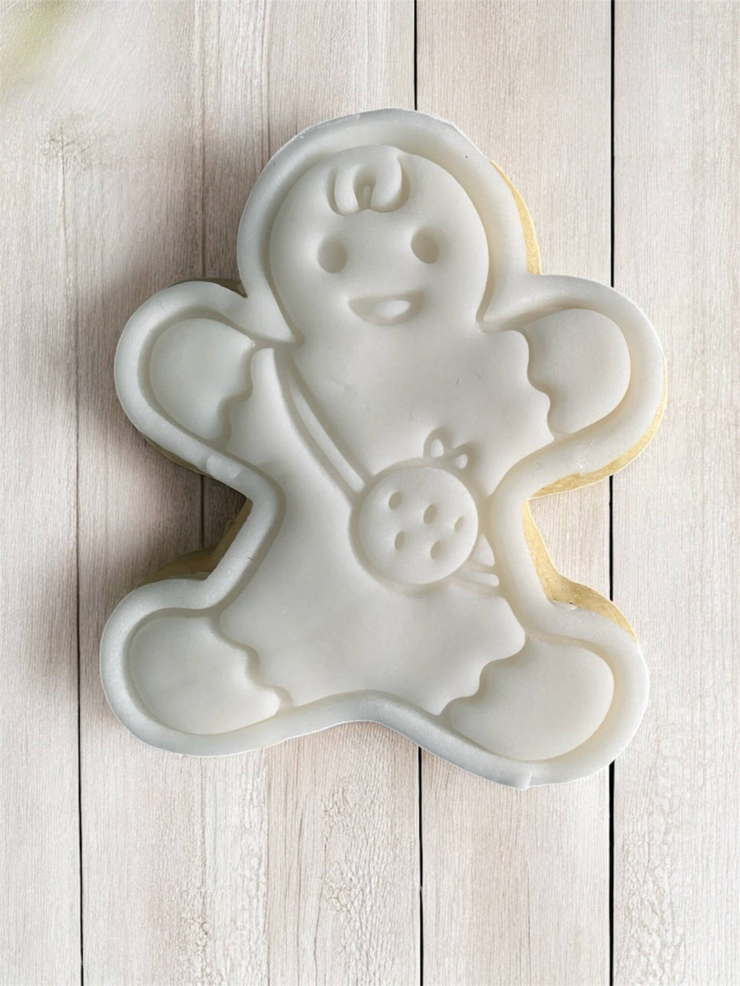 Child Paint Your Own Cookie – gingerbread child-shaped iced biscuit with edible paint palette and brush, fun and creative kids’ baking activity or holiday party treat.