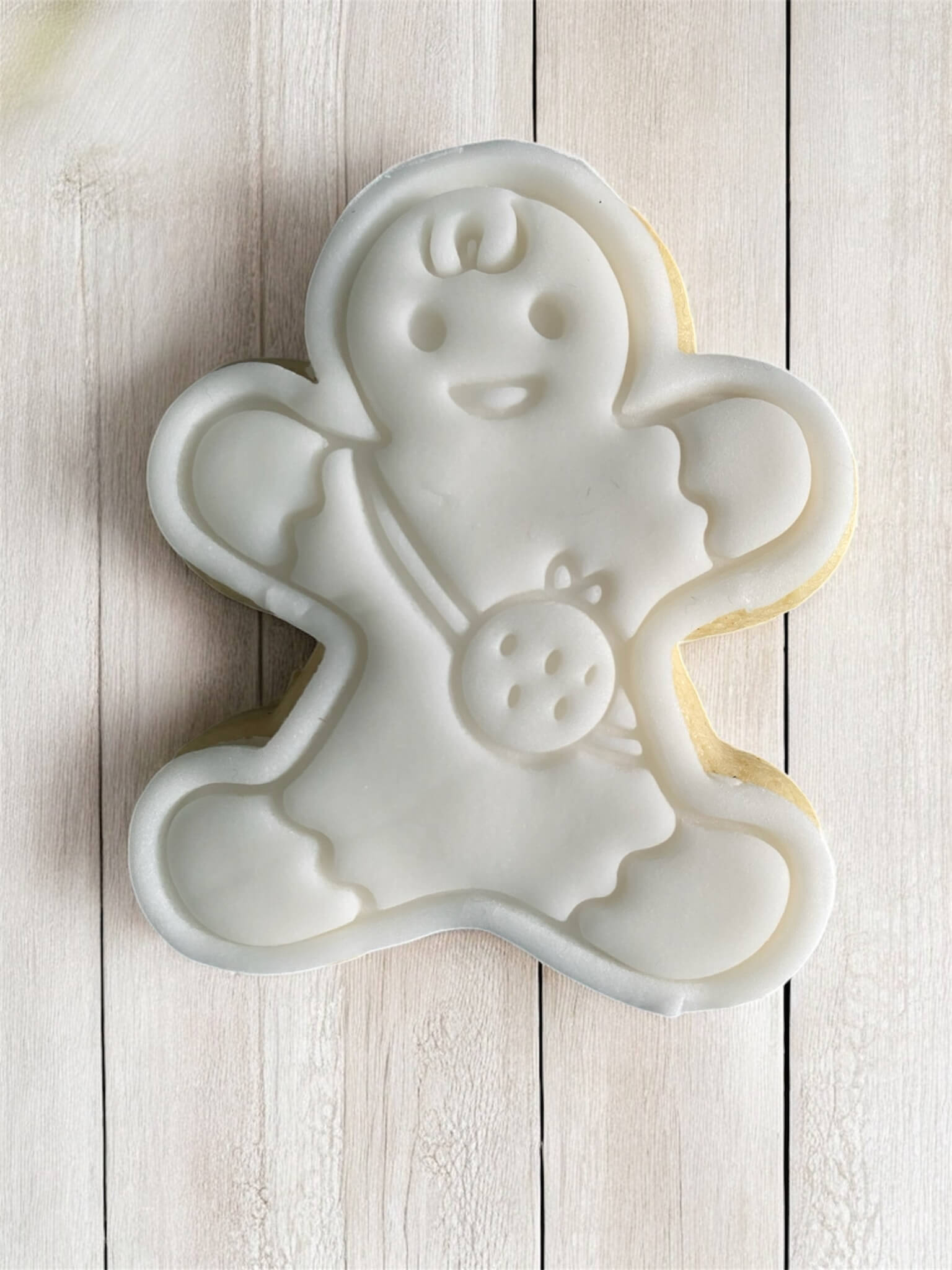Child Paint Your Own Cookie – gingerbread child-shaped iced biscuit with edible paint palette and brush, fun and creative kids’ baking activity or holiday party treat.