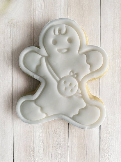 Child Paint Your Own Cookie – gingerbread child-shaped iced biscuit with edible paint palette and brush, fun and creative kids’ baking activity or holiday party treat.