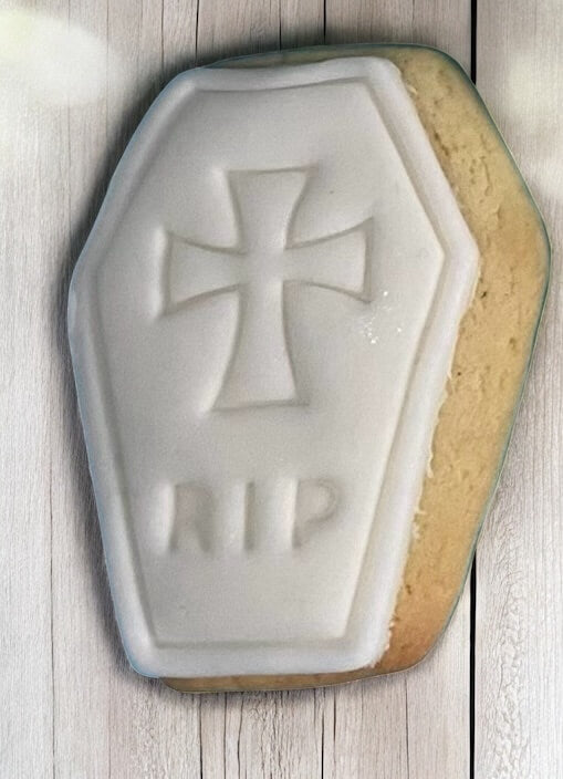 Coffin Paint Your Own Cookie – coffin-shaped iced biscuit with edible paint palette and brush, fun and creative kids’ Halloween baking activity or party treat.