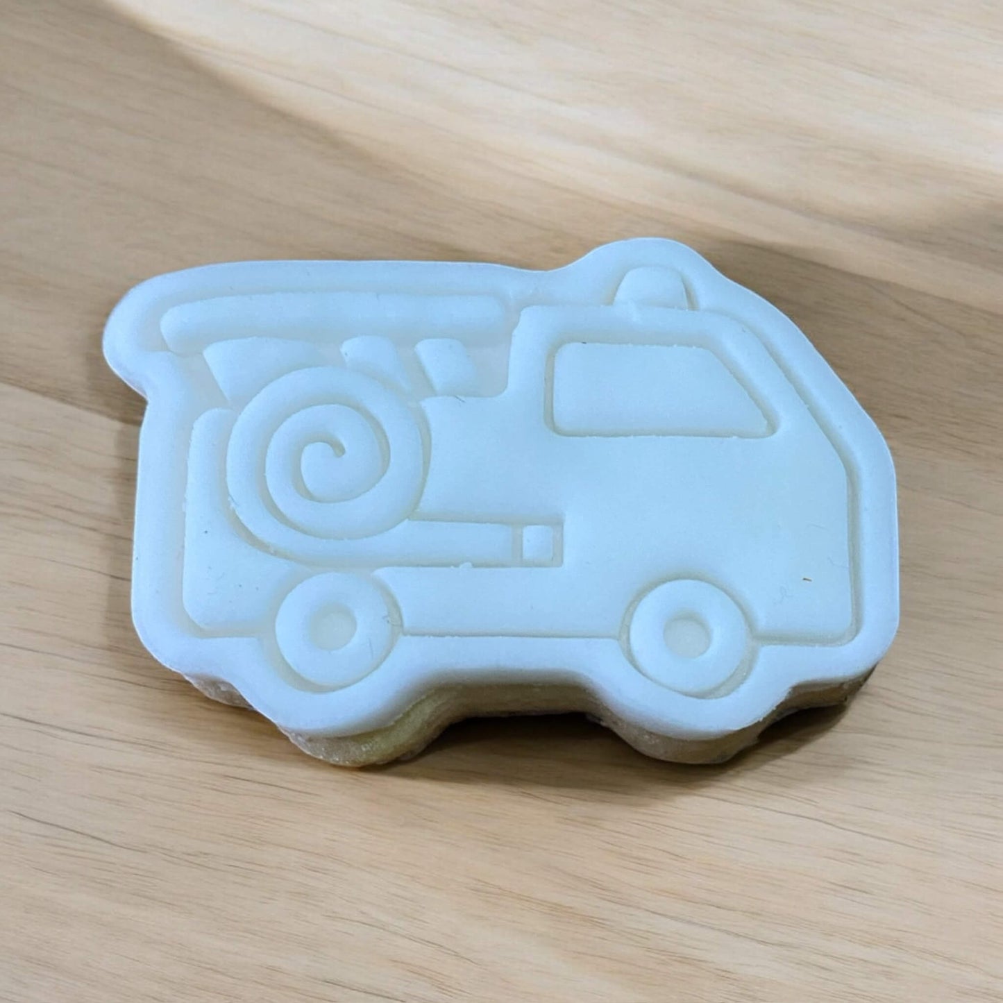 Fire Engine Paint Your Own Cookie – fire engine-shaped iced biscuit with edible paint palette and brush, fun and creative kids’ baking activity or transport-themed party treat.