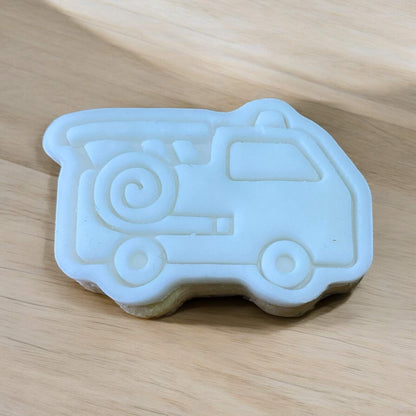 Fire Engine Paint Your Own Cookie – fire engine-shaped iced biscuit with edible paint palette and brush, fun and creative kids’ baking activity or transport-themed party treat.
