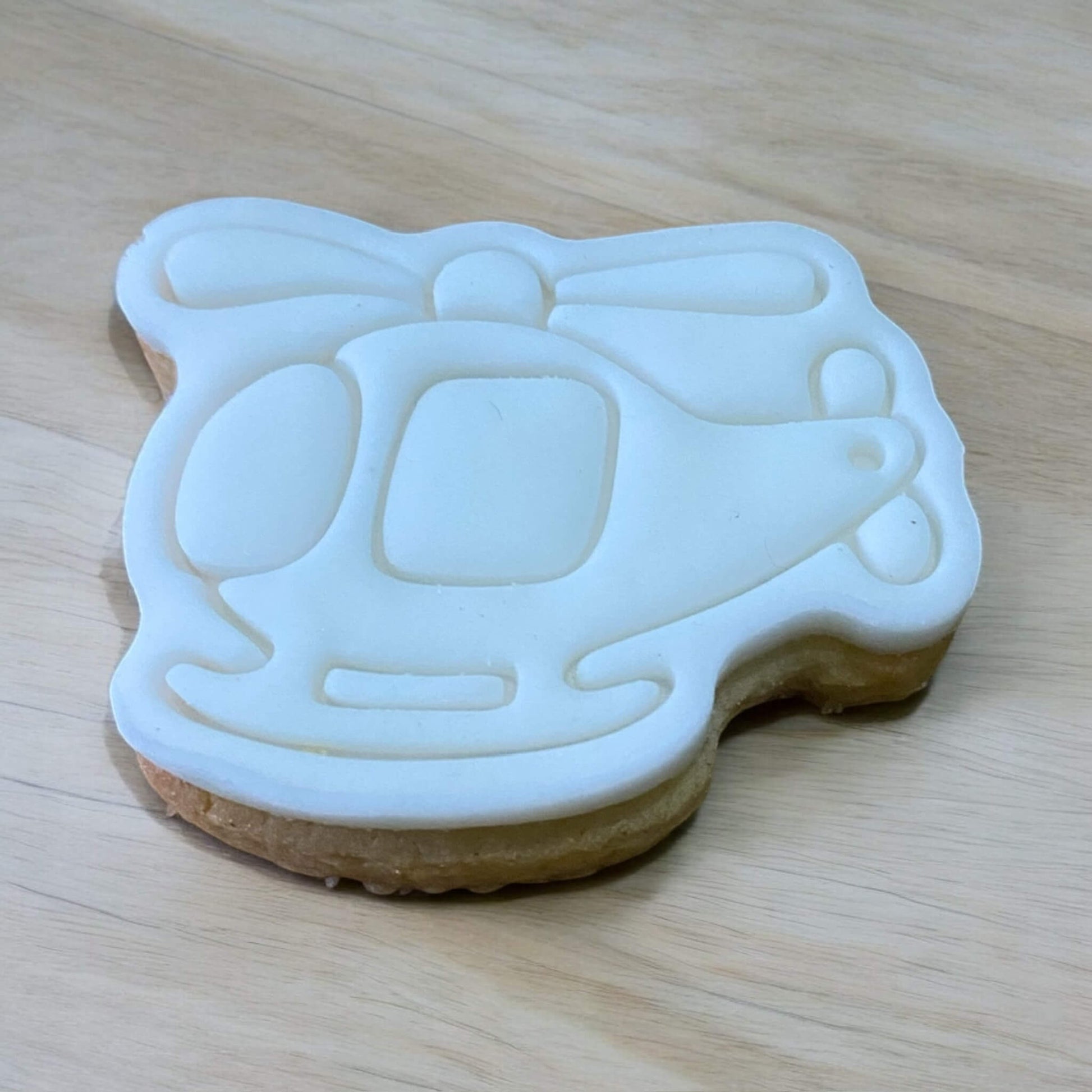 Helicopter Paint Your Own Cookie – helicopter-shaped iced biscuit with edible paint palette and brush, fun and creative kids’ baking activity or transport-themed party treat.