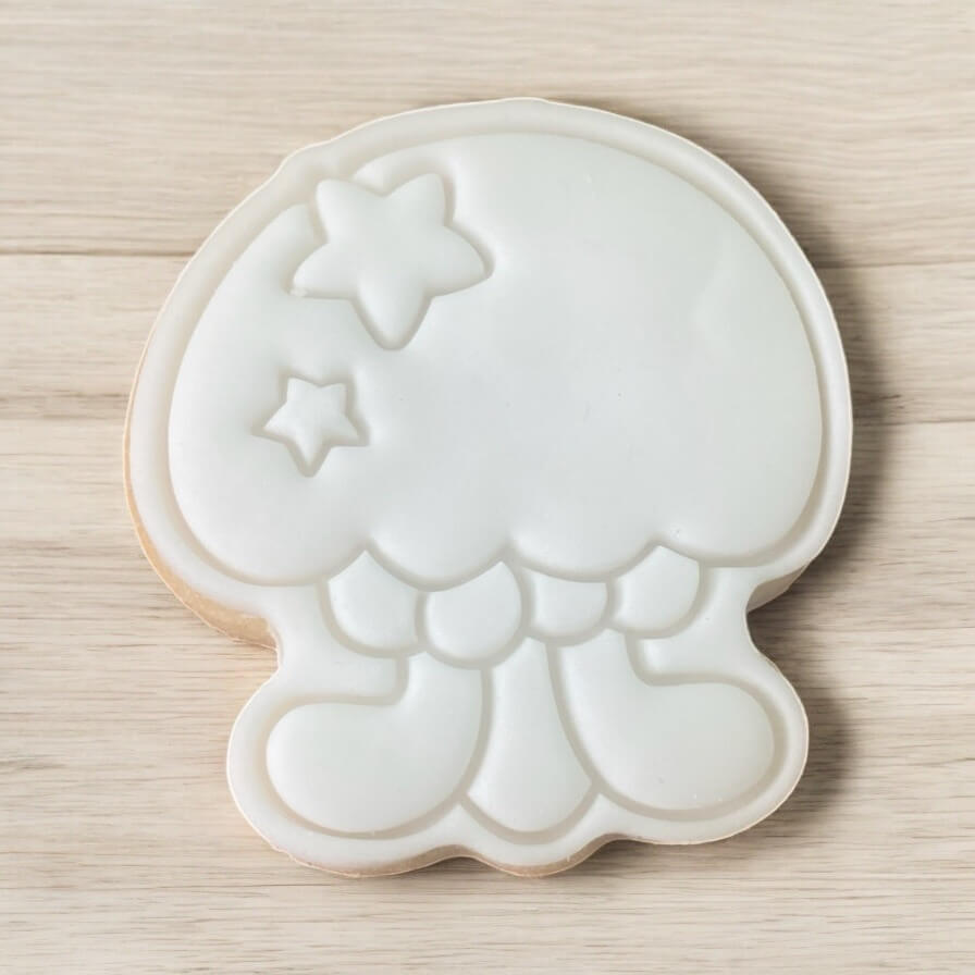 Jellyfish Paint Your Own Cookie – jellyfish-shaped iced biscuit with edible paint palette and brush, creative kids’ baking activity or mermaid-themed party treat.