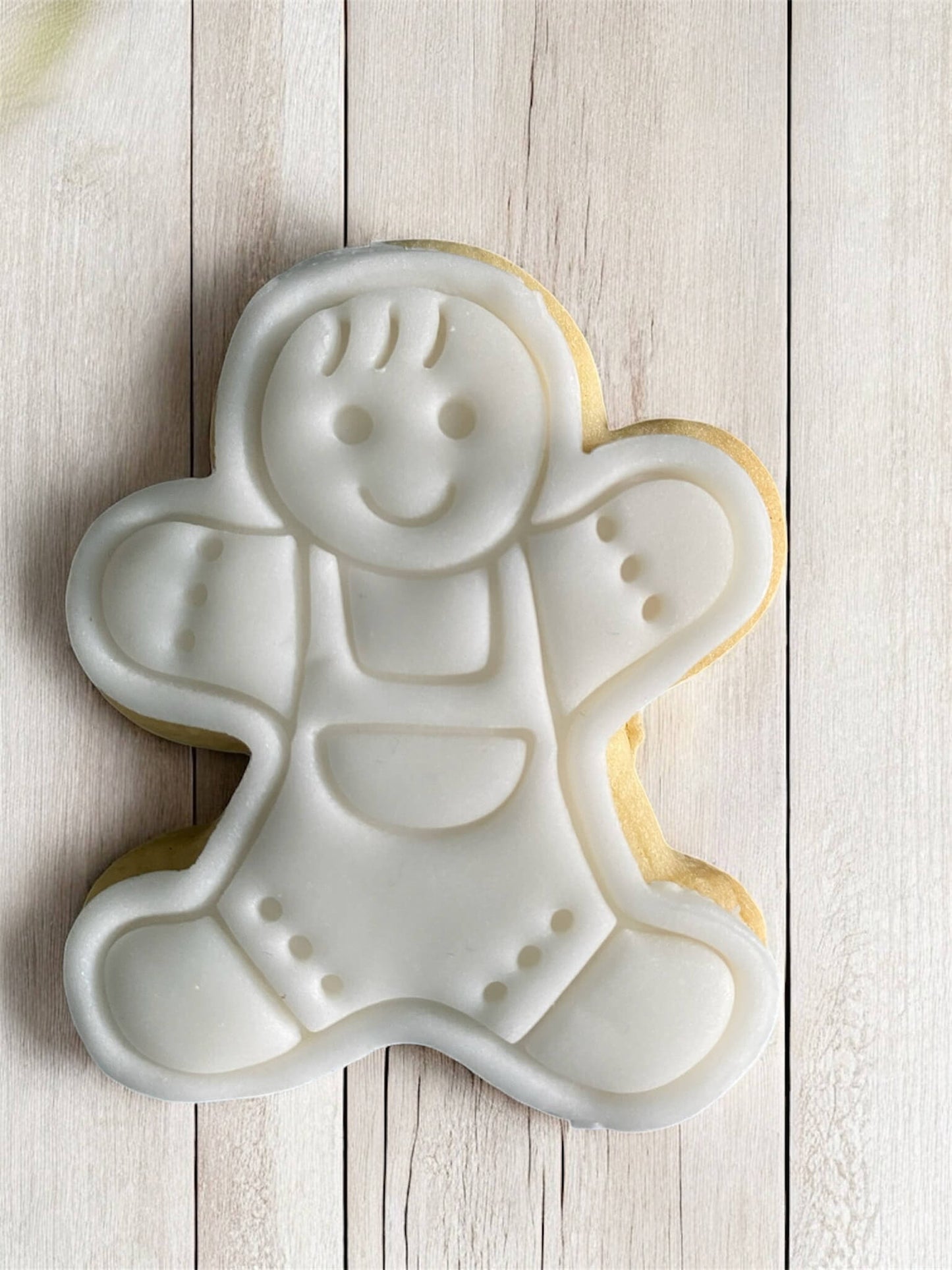 Child in Dungarees Paint Your Own Cookie – gingerbread child-shaped iced biscuit in dungarees with edible paint palette and brush, fun and creative kids’ baking activity or holiday party treat.