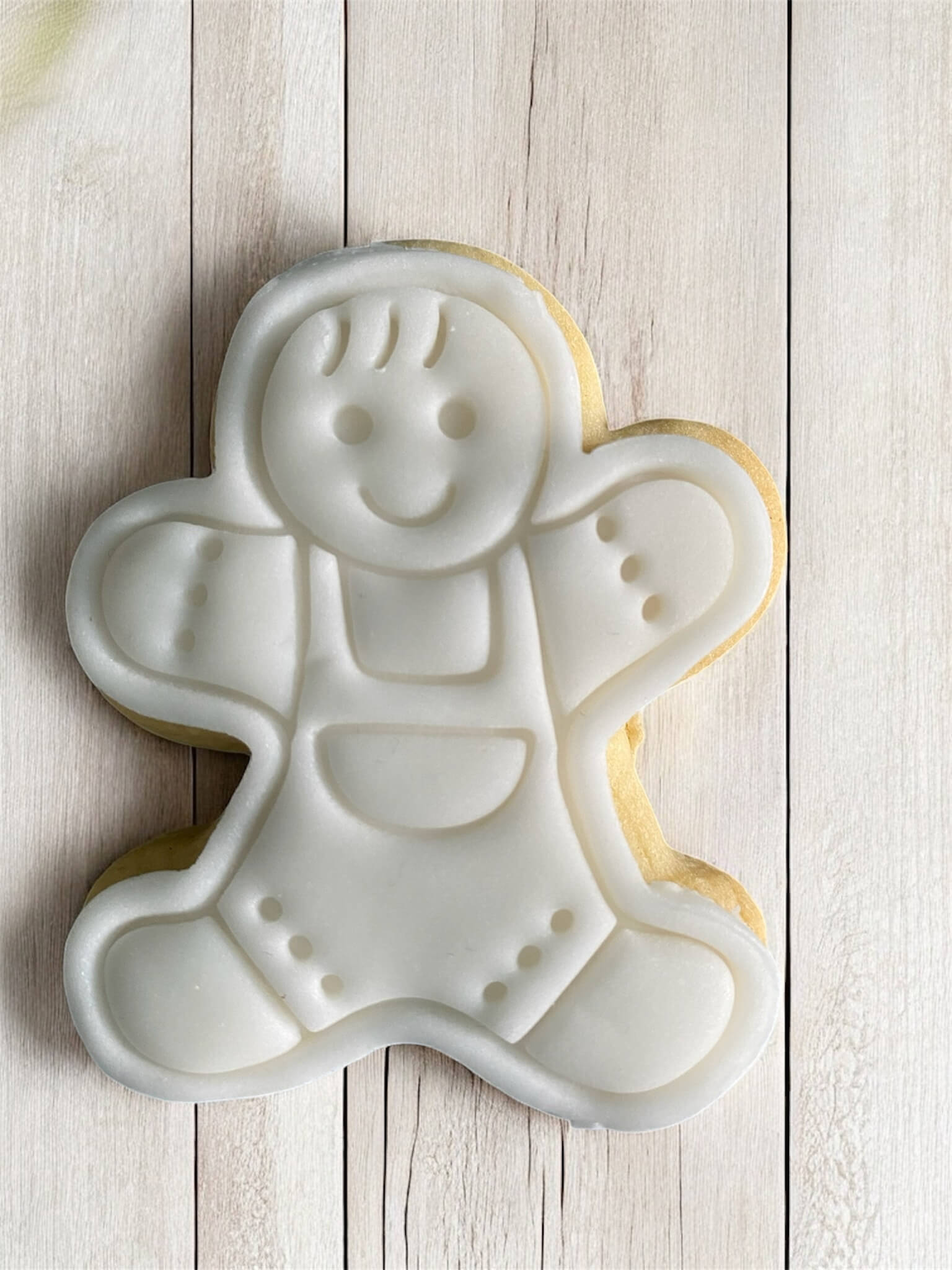 Child in Dungarees Paint Your Own Cookie – gingerbread child-shaped iced biscuit in dungarees with edible paint palette and brush, fun and creative kids’ baking activity or holiday party treat.