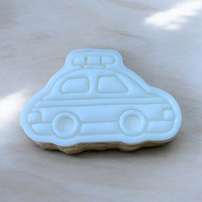 Police Car Paint Your Own Cookie – police car-shaped iced biscuit with edible paint palette and brush, fun and creative kids’ baking activity or transport-themed party treat.