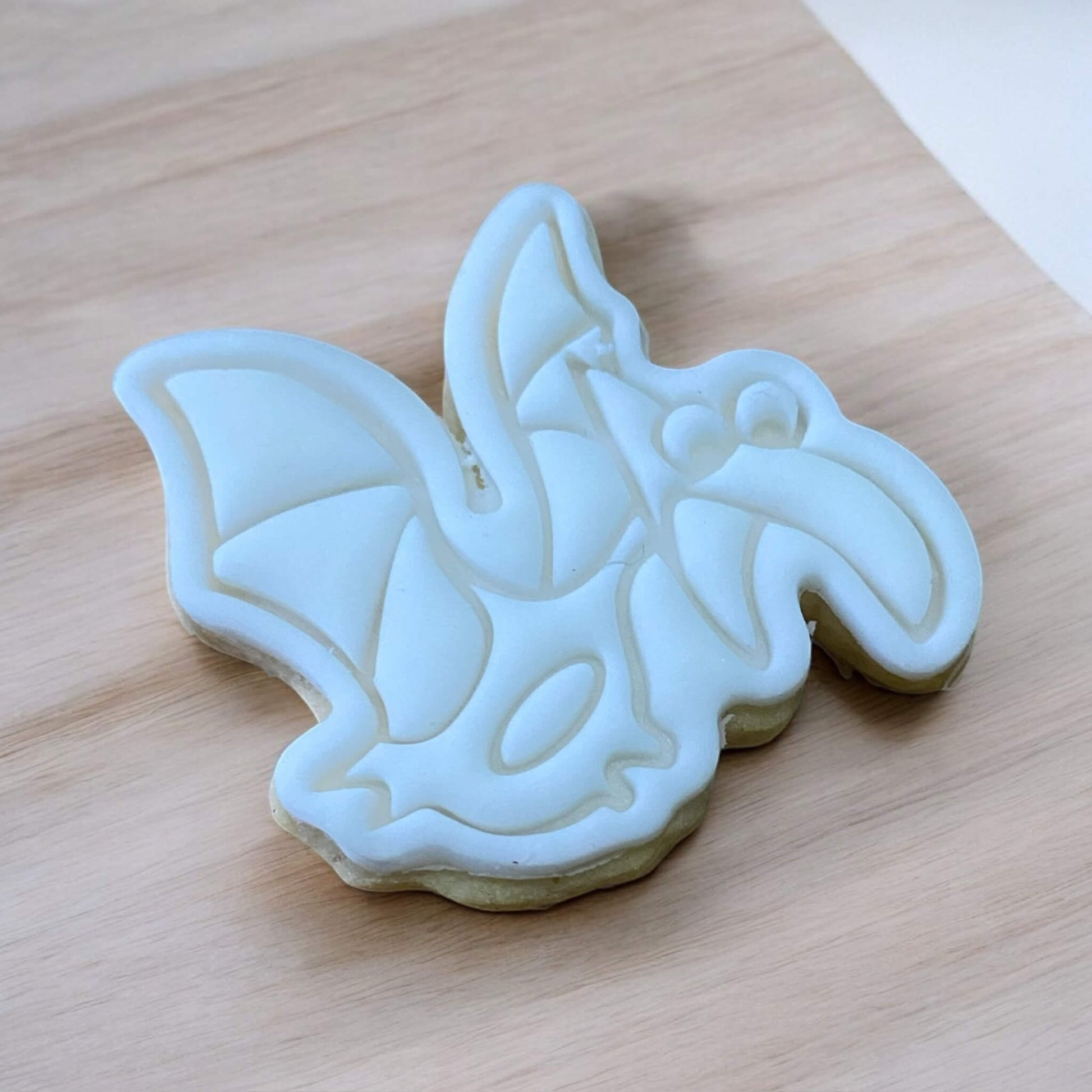 Pterodactyl Paint Your Own Cookie – flying dinosaur shaped iced biscuit with edible paint palette and brush, fun and creative kids’ baking activity.