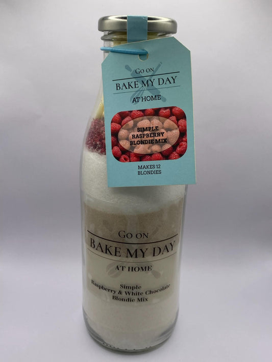 Raspberry & White Chocolate Blondie Baking Mix Bottle – bake-at-home jar kit UK with pre-measured ingredients to make 12 soft, chewy homemade Raspberry & White Chocolate blondies in a 9” x 9” tray