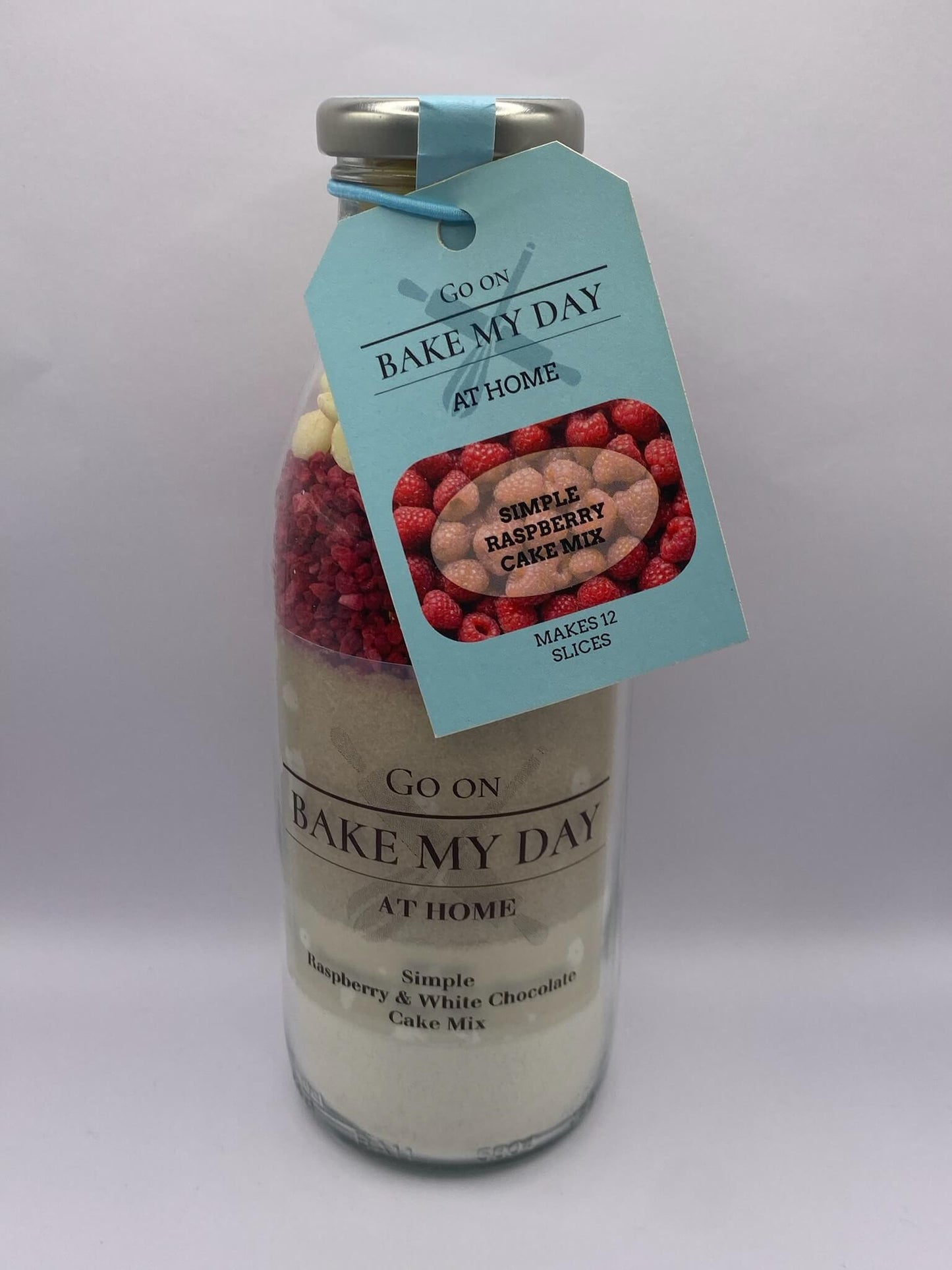 Bake My Day Raspberry & White Chocolate Gluten-Free Wholesale Cake Baking Mix – bottled mix for retailers, easy bake-at-home gluten-free raspberry and white chocolate cake mix, ideal for shops, online stores, and gift packs.