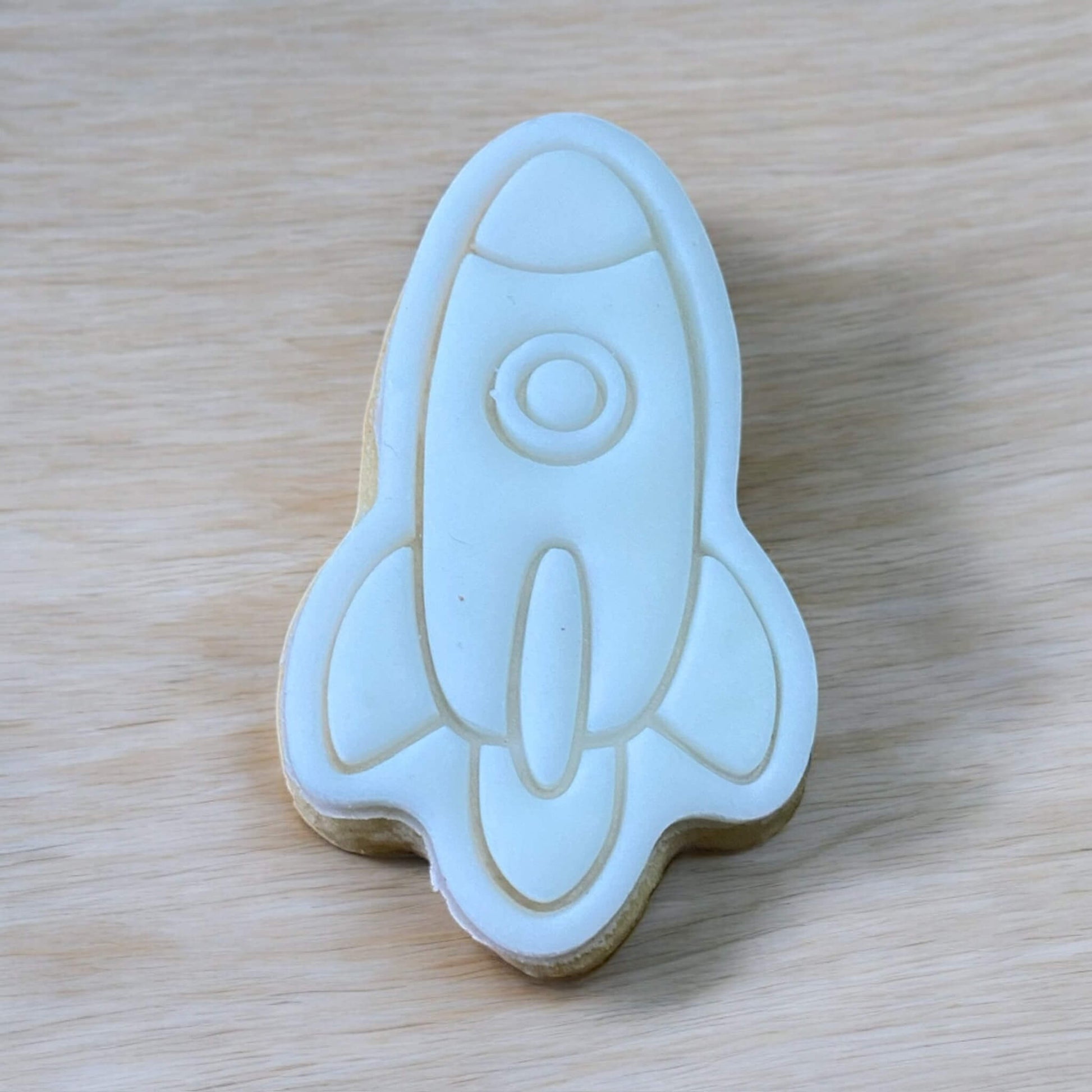 Rocket Paint Your Own Cookie – rocket-shaped iced biscuit with edible paint palette and brush, creative kids’ baking activity or fun space-themed party treat.