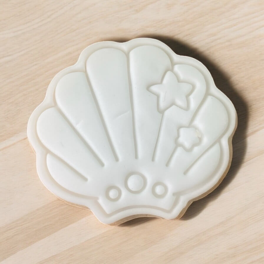 Seashell Paint Your Own Cookie – seashell-shaped iced biscuit with edible paint palette and brush, fun and creative kids’ baking activity or mermaid-themed party treat.