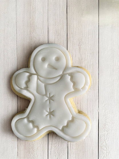 Snowman Paint Your Own Cookie – snowman-shaped gingerbread biscuit with edible paint palette and brush, fun and creative kids’ baking activity or holiday party treat.