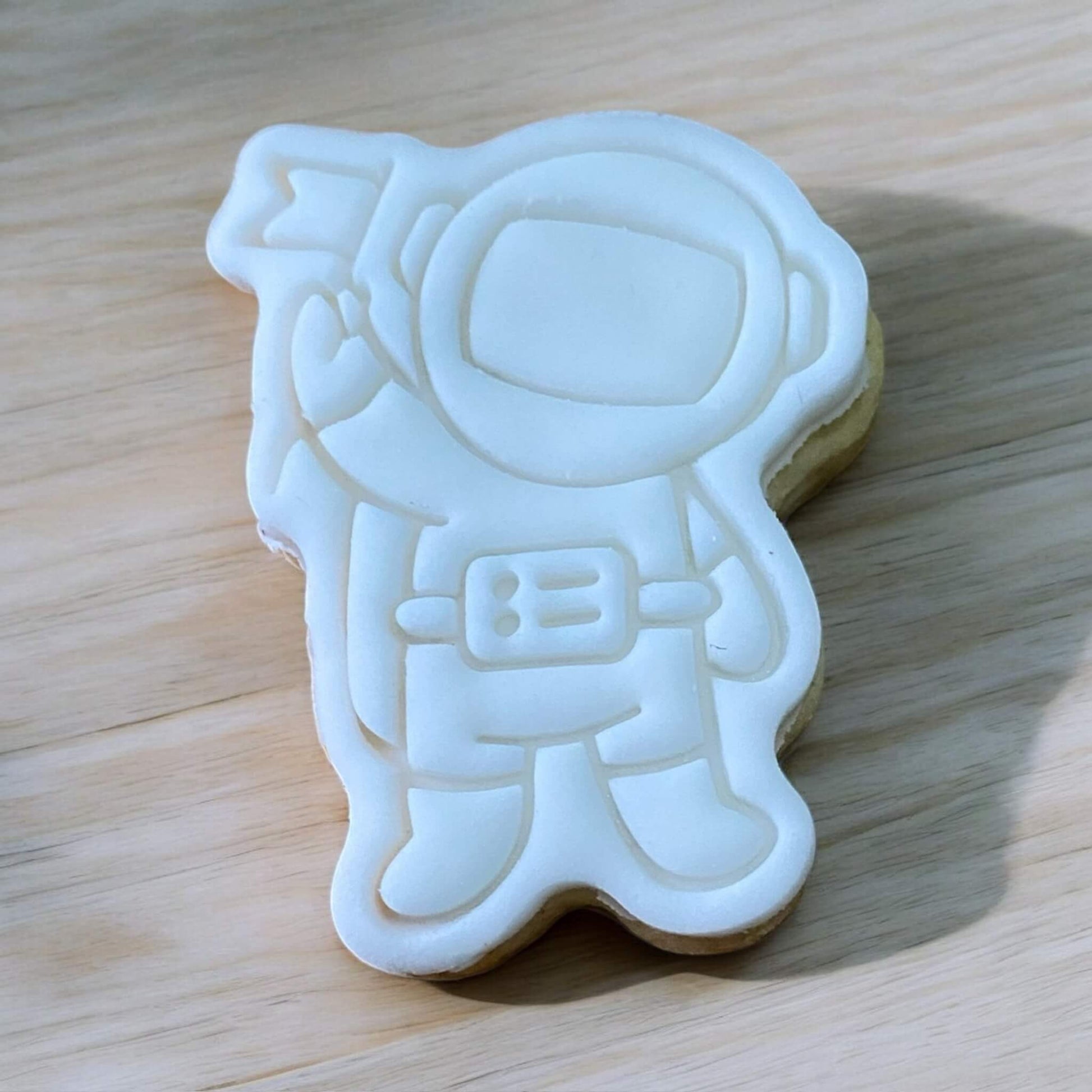 Spaceman Paint Your Own Cookie – astronaut-shaped iced biscuit with edible paint palette and brush, fun and creative kids’ baking activity or space party treat.