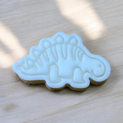 Stegosaurus Paint Your Own Cookie – iced dinosaur biscuit with edible paint palette and brush, creative kids’ activity and fun party treat.