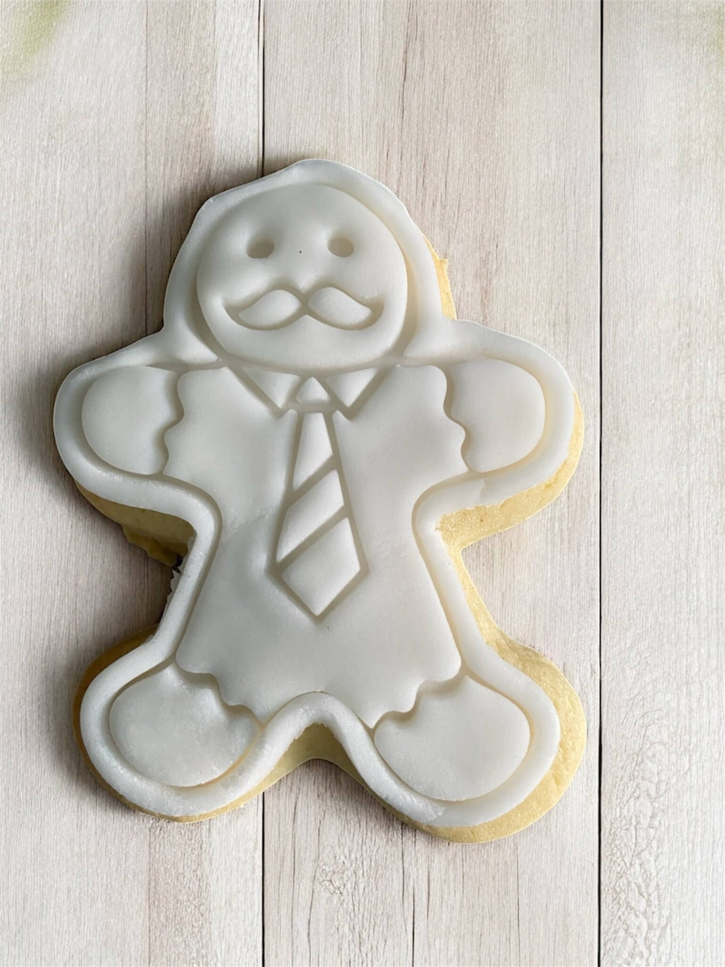 Business Man Paint Your Own Cookie – gingerbread man-shaped iced biscuit in business attire with edible paint palette and brush, creative kids’ baking activity or holiday party treat.