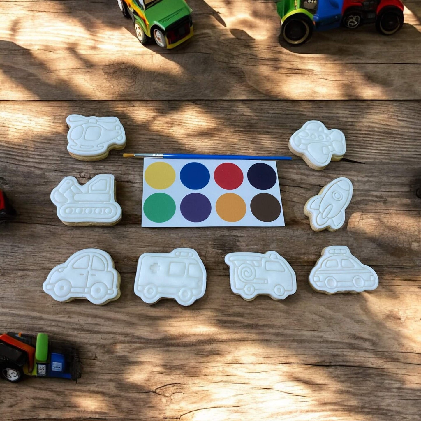 Transport Paint Your Own Cookie Set – vehicle-themed iced biscuits with edible paint palette and brush, fun and creative kids’ baking activity or party treat.