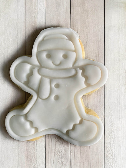 Man in Winter Outfit Paint Your Own Cookie – gingerbread man-shaped iced biscuit in winter clothing with edible paint palette and brush, fun and creative kids’ baking activity or holiday party treat.